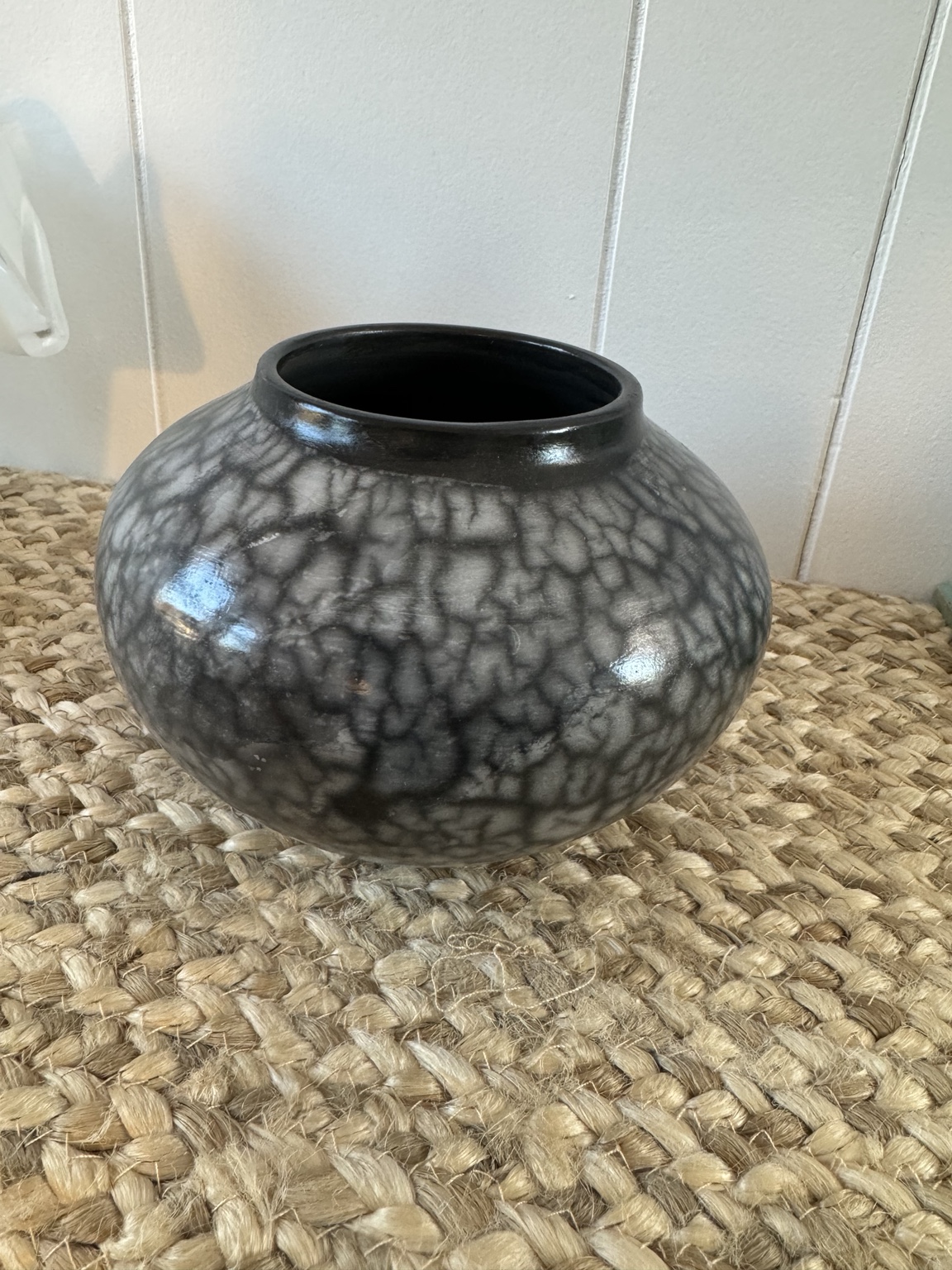 Black textured ceramic vessel